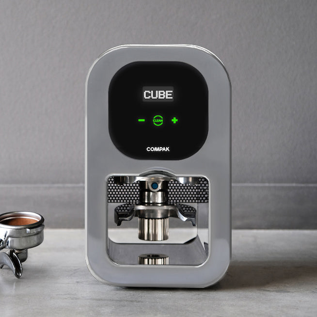 Grinder Maker Compak Unveils the Cube Tamp Automatic TamperDaily Coffee  News by Roast Magazine